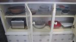 Equipped kitchen with toaster, casserole dishes, plastic containers
